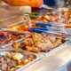 Illustration for article titled How do all-you-can-eat buffets make money?